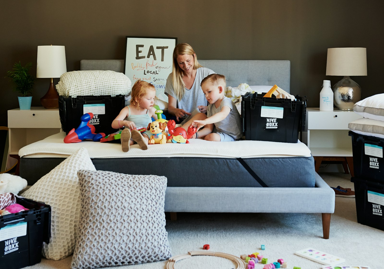 3 children sitting on gray couch, renters